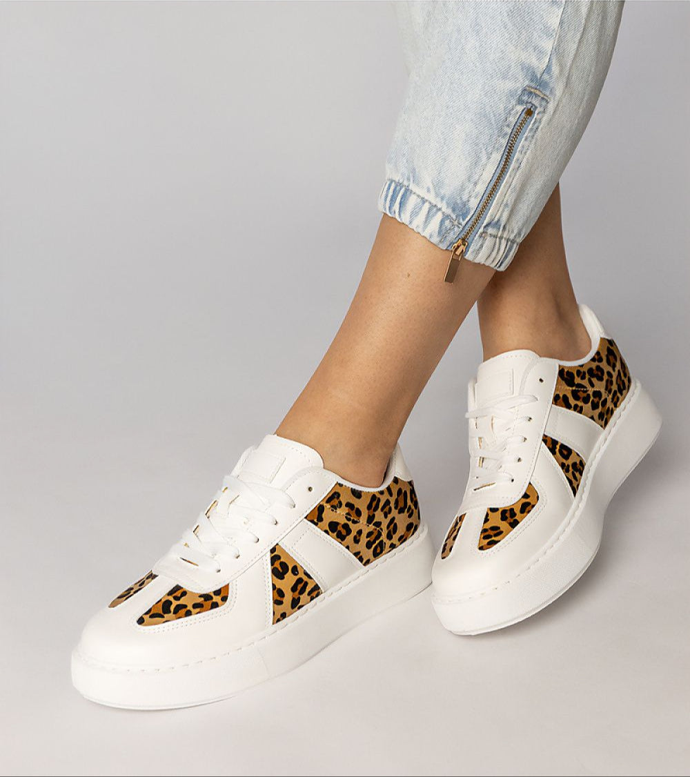 Tirella Patterned Platform Sneakers with white panther motif and synthetic leather, featuring a gently arched platform and lace-up closure.