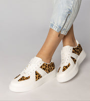 Tirella Patterned Platform Sneakers with white panther motif and synthetic leather, featuring a gently arched platform and lace-up closure.