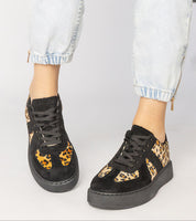 Stylish Tirella Patterned Platform Sneakers with panther motif, comfortable fabric insole, synthetic leather, and lace-up closure.