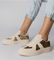 Tirella Patterned Platform Sneakers with white-on-panther motif, synthetic leather, and lace-up closure for modern comfort and style.