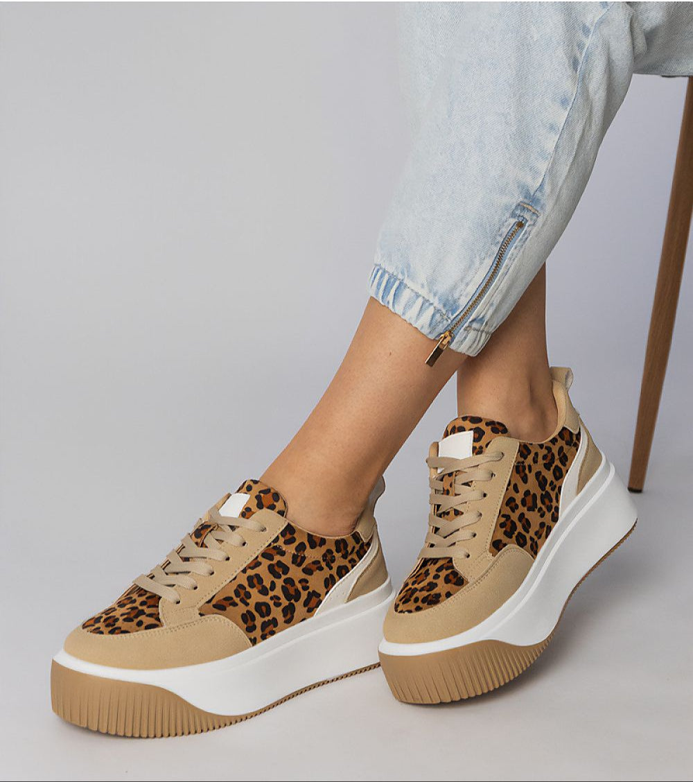 Voretta Panther Platform Sneakers with eco-suede and panther pattern, featuring sculptural sole and cushioned insole for comfort.