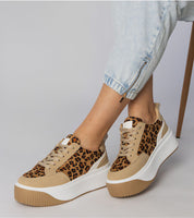 Voretta Panther Platform Sneakers with eco-suede and panther pattern, featuring sculptural sole and cushioned insole for comfort.