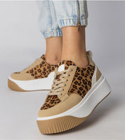 Voretta Panther Platform Sneakers with sculptural sole, eco-suede finish, and leopard print pattern, ideal for urban fashion.