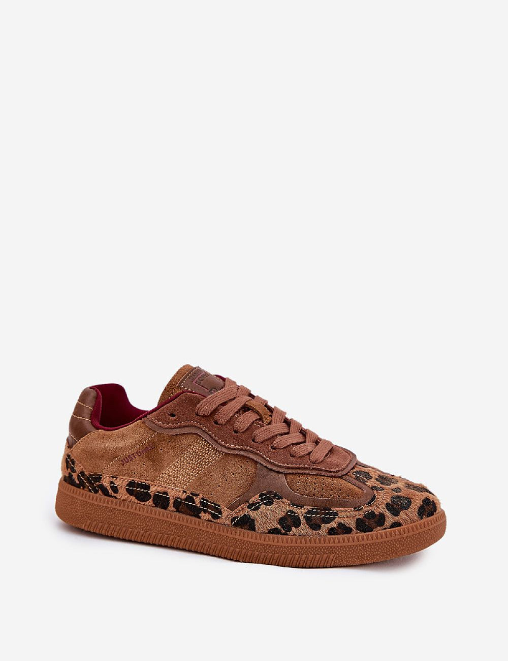 Brown suede sneaker with leopard print and textured design, featuring a durable sole and stylish urban appeal.