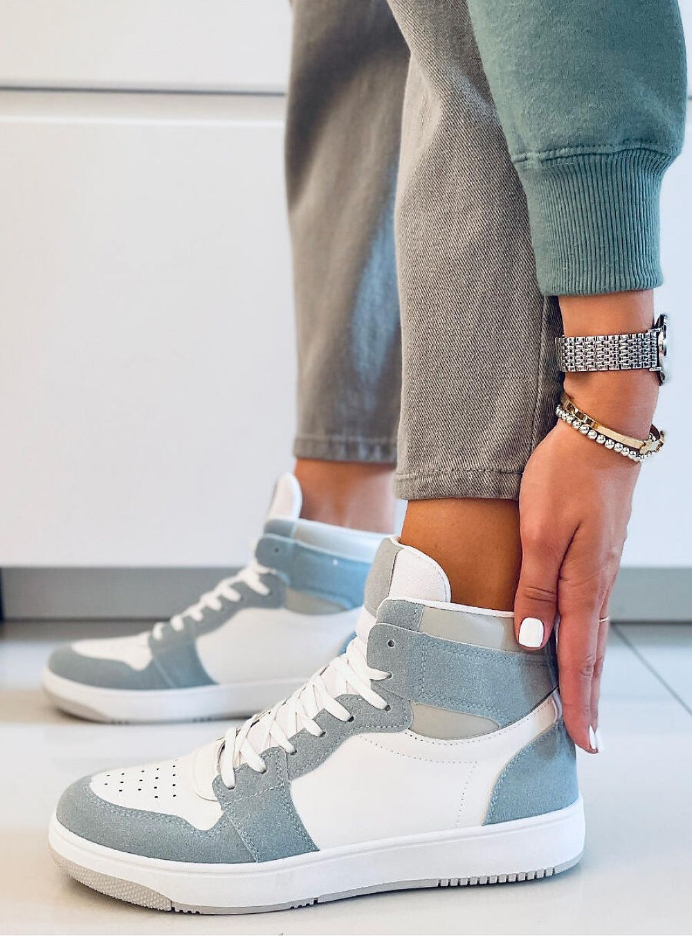 Verdina colorblock lace-up sneakers with eco-leather and suede accents, featuring ankle-high design and breathable lightweight lining.