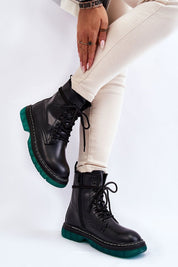 Varnisse Hollowtread platform boots with lace-up design and green treaded sole, showcasing style and functionality.