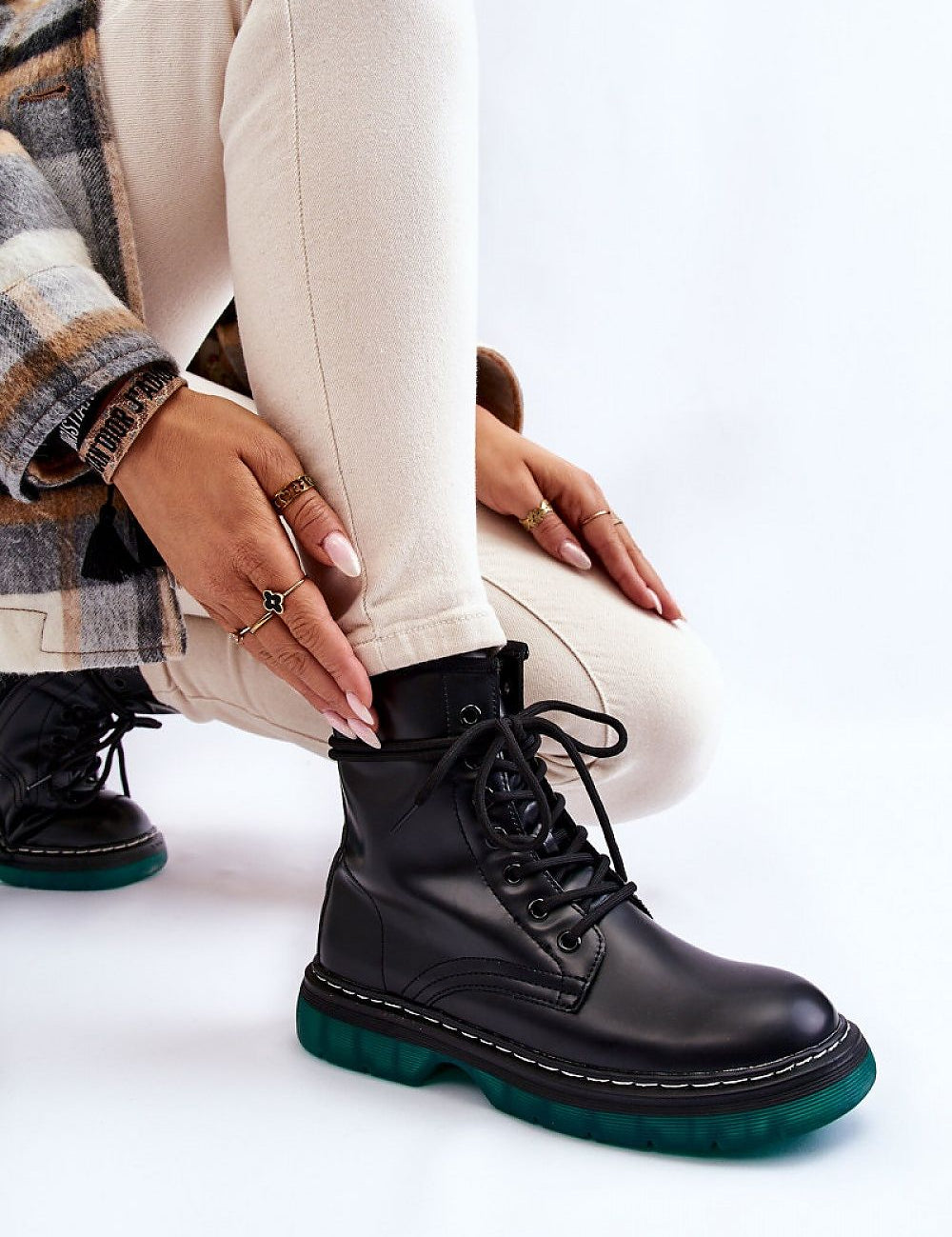 Varnisse Hollowtread Warm Structure platform boots with eco leather look, lace-up, side zipper, and green treaded sole for stability.