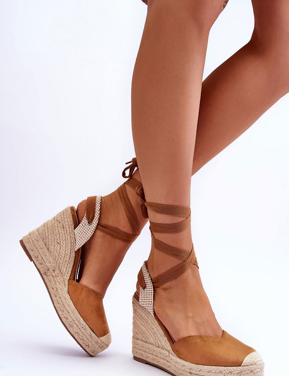 Liorenna lace-up platform sandals in brown eco-suede with jute-wrapped sole, showcasing boho style and height.