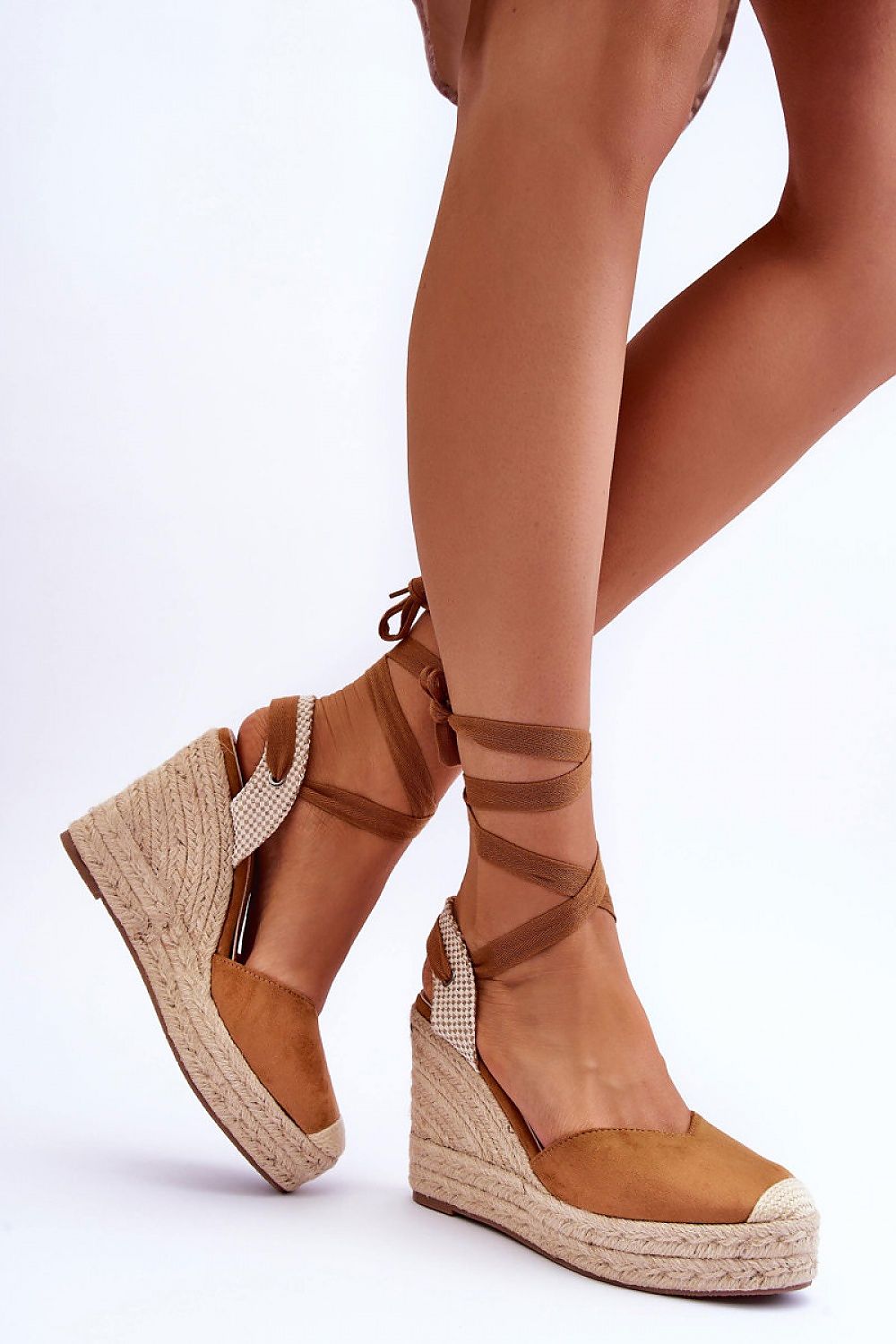Liorenna lace-up platform sandals in brown eco-suede with jute-wrapped sole, showcasing boho style and height.