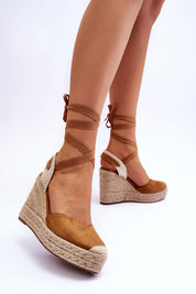 Liorenna lace-up platform sandals in eco-suede with jute-wrapped sole and calf lacing, offering boho style and comfort.