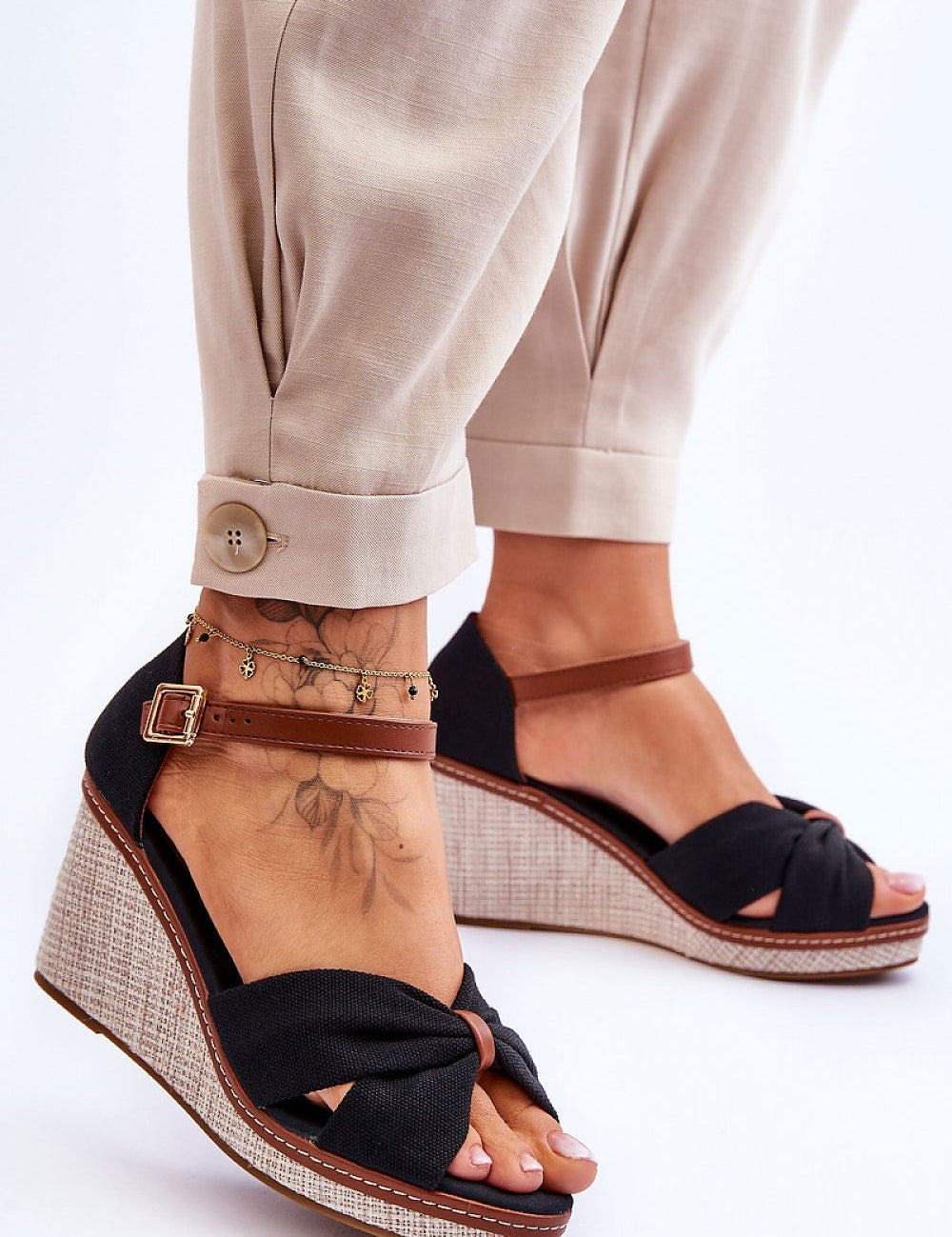 Larvella woven fabric buskins with sculpted heel and ankle strap, perfect for stylish and comfortable summer wear.