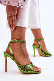 Green strappy tie-up high-heeled sandals with stiletto heel and adjustable ankle strap in eco leather, perfect for festive occasions.