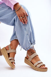 Woman wearing Sivetta Cushioned Platform Sandals in eco leather with Velcro fastening and breathable suede insole.