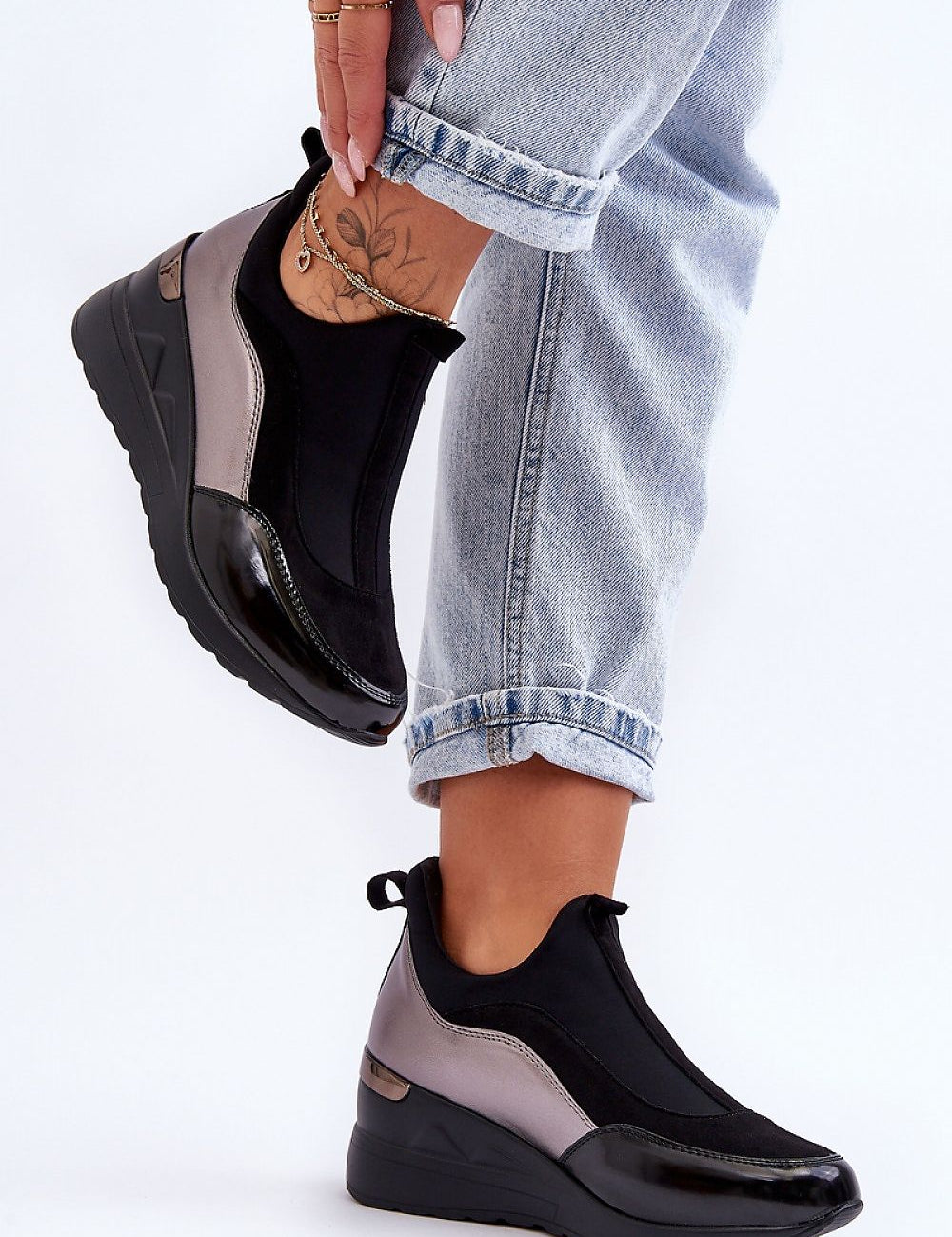 Lestora Dual-Layer Slip-On Sneakers with two-texture upper and wedge heel, perfect for casual and activewear styling.