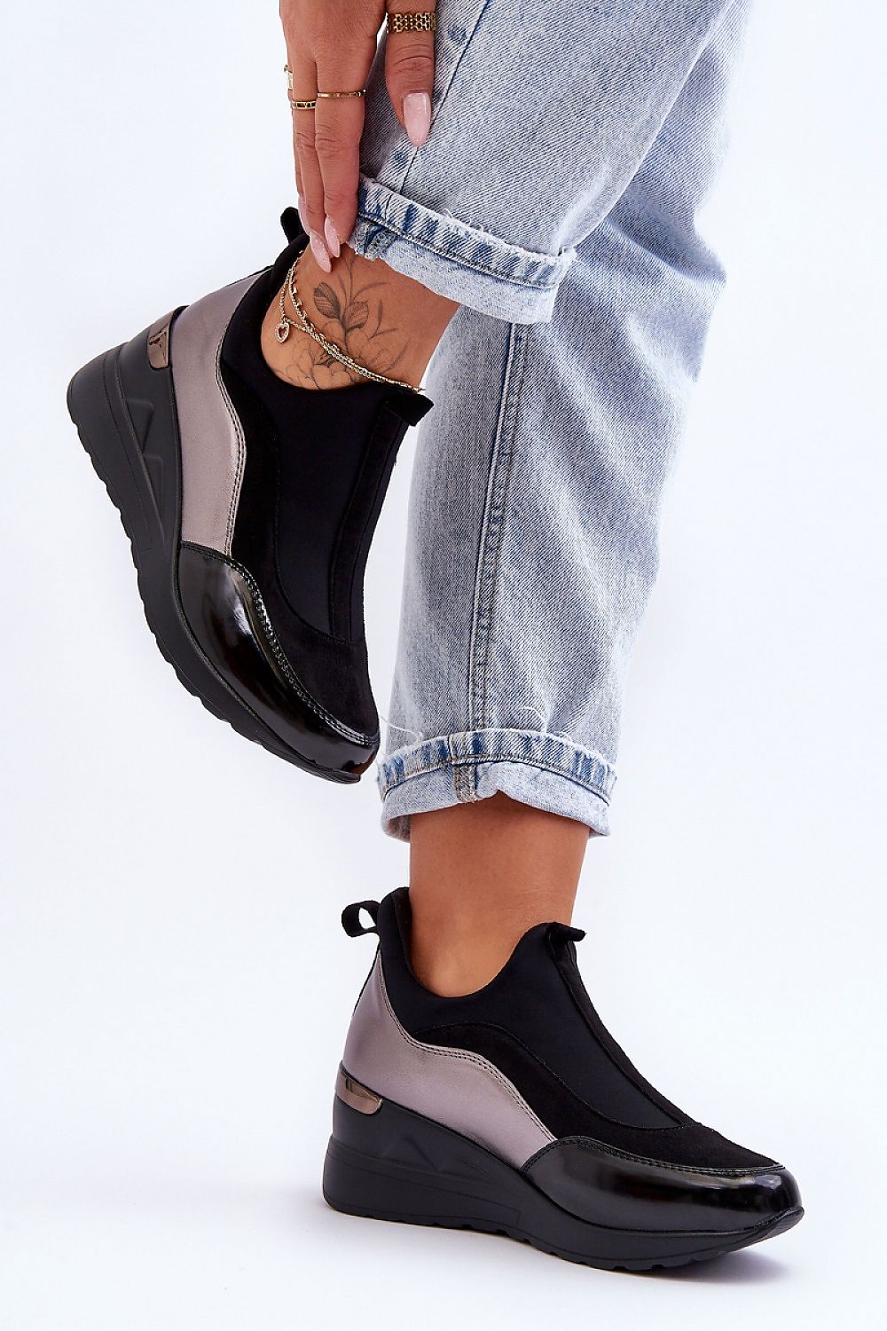 Lestora Dual-Layer Slip-On Sneakers with two-texture upper and wedge heel, perfect for casual and activewear styling.