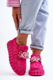 Verelune Crystal Platform Slip-Ons in pink eco-suede with sparkling crystal accents and thick soles, shown worn with light jeans.