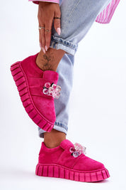 Magenta Verelune Crystal Platform Slip-Ons with eco-suede texture, crystal accents, and thick sole, modeled with cuffed jeans.