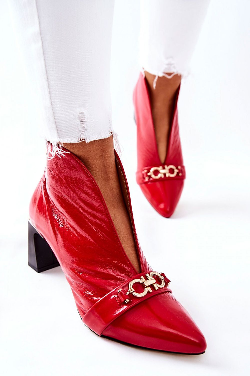 Red Aurelinne Crestline Leather Heights heel boots with gold accent, smooth leather finish, and sculpted heel for a sophisticated look.