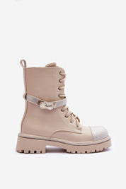 Beige statement boot with rhinestone strap, grooved platform sole, artificial leather upper, zipper and lace closure for modern style.