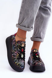 Person wearing Rinalve Leather Platform Sneakers with colorful pattern, showcasing comfort and style on a sculpted platform sole.