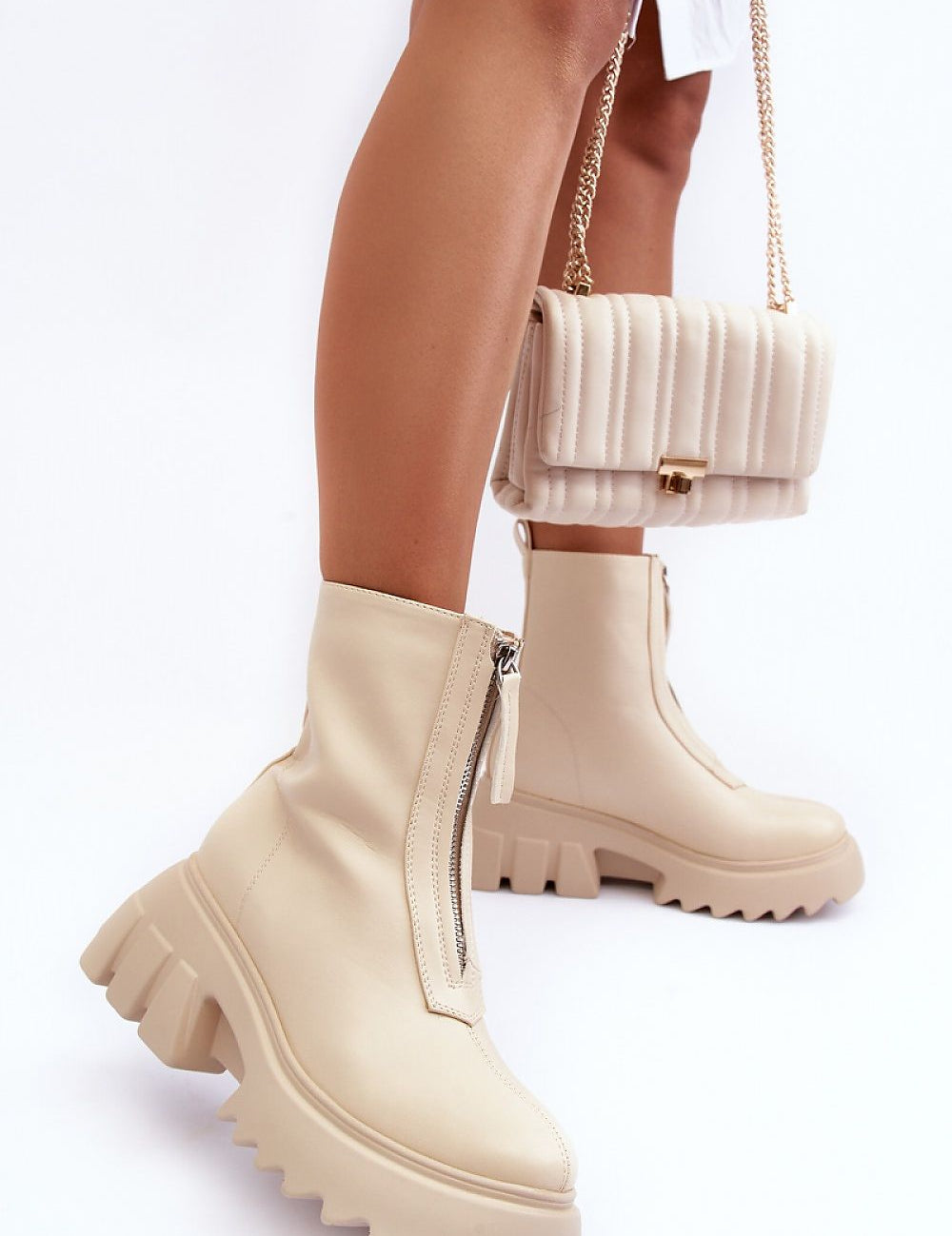 Zarosa Chunky Platform Zip Boots in cream eco leather with front zipper, chunky heel, shown with matching quilted handbag.