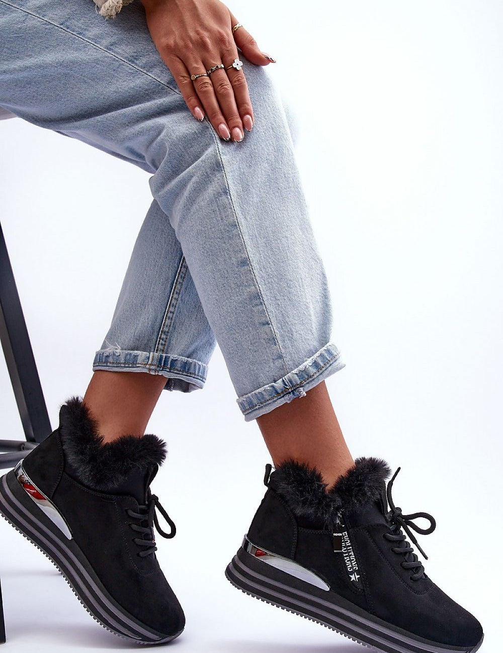 Evolutions Fur-Trimmed Winter Sneakers with eco-suede, warm fur collar, mirrored heel accent, and platform silhouette in black.